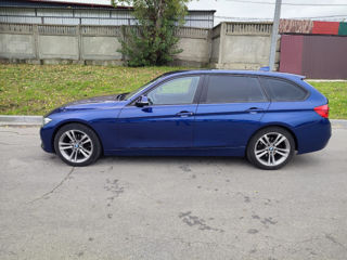 BMW 3 Series Touring foto 3