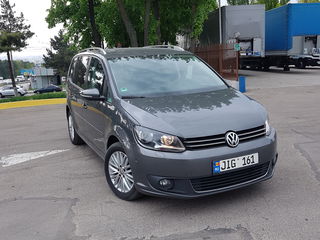 Volkswagen Touran foto 1