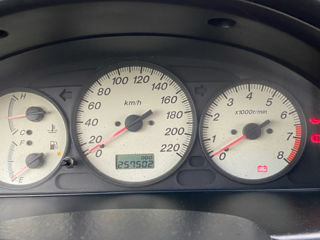 Mazda 323 фото 5