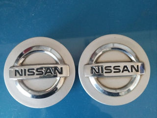Продам два оригинальных колпачка Nissan