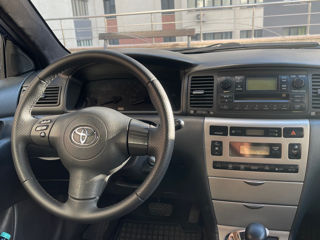 Toyota Corolla фото 7