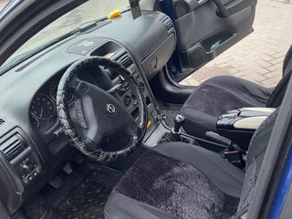 Opel Astra фото 1