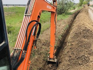 La comanda Bobcat / Miniexcavator / Buldoexcavator / Kamaz foto 5