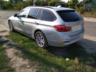 BMW 3 Series Touring foto 3