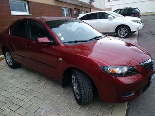 Mazda 3 foto 1