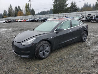 Tesla Model 3 foto 1