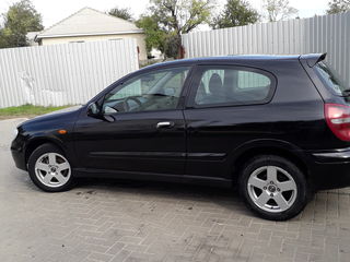 Nissan Almera foto 2