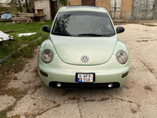 Volkswagen New Beetle foto 2