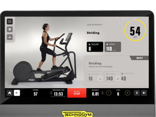 Профессиональный эллиптический тренажор Technogym foto 3