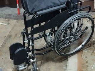 Новая инвалидная многофункциональная кресло- каталка.