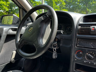 Opel Astra фото 9