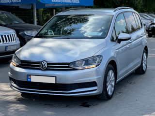 Volkswagen Touran foto 1