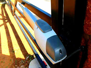 Sisteme de deschidere automată a porților batante,autoportante.Garduri metalice. foto 1