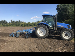 Трактор NewHolland t6070 foto 3