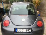 Volkswagen New Beetle foto 2