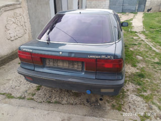 Запчасти Mitsubishi Lancer lV foto 4