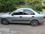 Nissan Almera foto 1