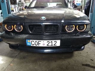 Фары hella black на bmw е34 foto 3