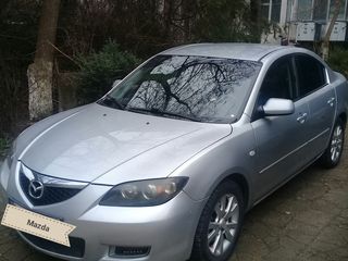 Mazda 3 foto 1