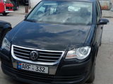 Volkswagen Touran foto 1