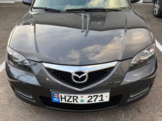 Mazda 3 foto 1