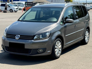 Volkswagen Touran foto 1