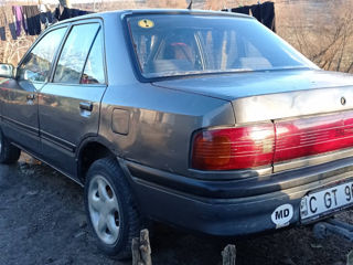 Mazda 323 foto 2