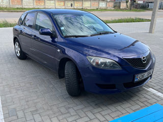 Mazda 3 foto 1