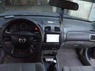 Mazda 323 foto 4