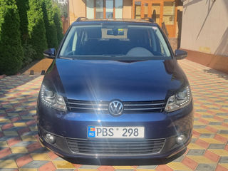 Volkswagen Touran foto 1