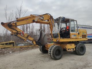 Se vinde excavator pe roti liebherr a902 . продается колёсный экскаватор liebherr a902