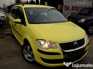 Volkswagen Touran foto 1