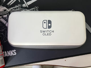 Vând nintendo switch oled nou cu o joacă fifa 18 și cu o husă de purtat foto 8