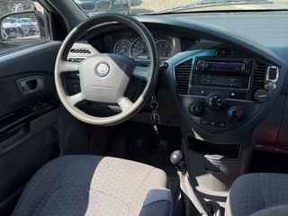 KIA Carens фото 4