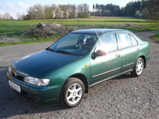 Nissan Almera foto 1