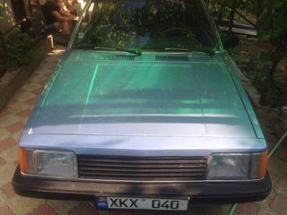 Mazda 323 foto 1