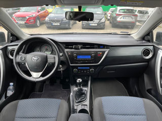 Toyota Auris фото 9