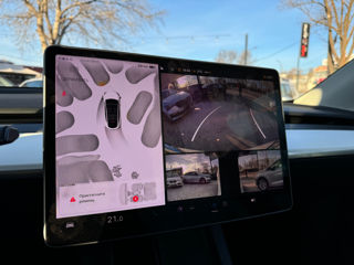 Tesla Model Y foto 11