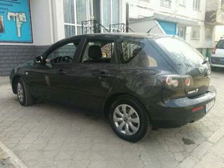 Mazda 3 foto 1