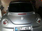 Volkswagen New Beetle foto 7