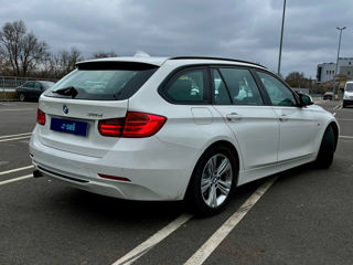 BMW 3 Series Touring foto 4