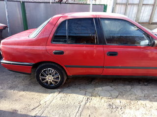 Nissan Sunny foto 1