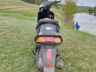 Suzuki AG100 foto 2