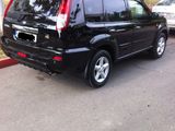 Nissan X-Trail foto 2