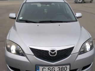 Mazda 3 foto 1