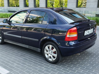Opel Astra фото 1