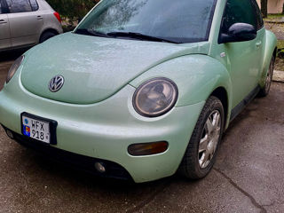 Volkswagen New Beetle foto 2