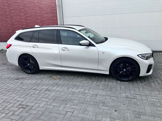 BMW 3 Series Touring foto 3