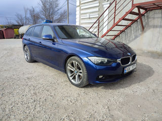 BMW 3 Series Touring foto 1