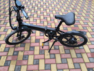 Bicicletă electrică foto 1